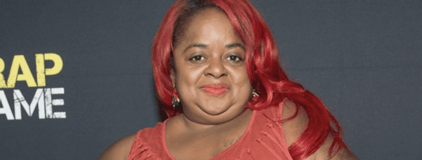 Person with red hair at an event.